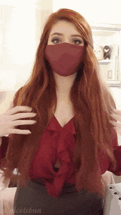 Busty masked redhead shaking..