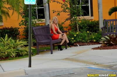Blonde slut hikes up her..