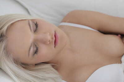 Sleeping blonde awakes to a..