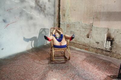 Punky blonde in rope..