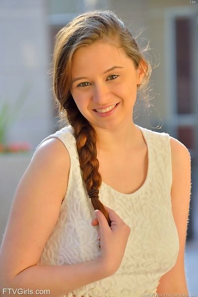 Dress clad teen shows big..